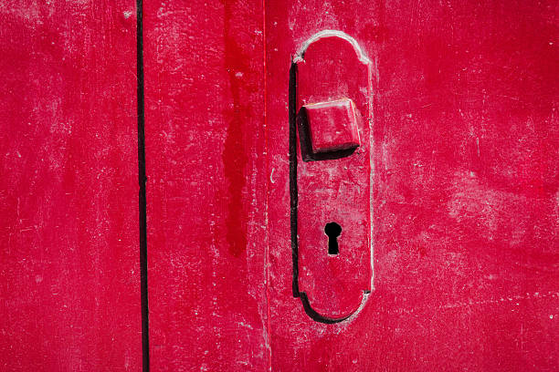 A goccia in acciaio inossidabile porta verniciato di rosso - foto stock