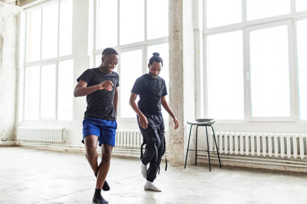 istock Two black men dancing together at dance lesson in exercise room 1816403578