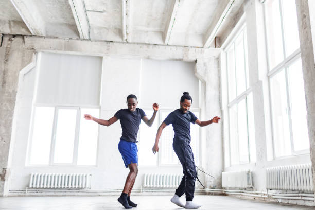 istock Two black men dancing together at dance lesson in exercise room 1816406282