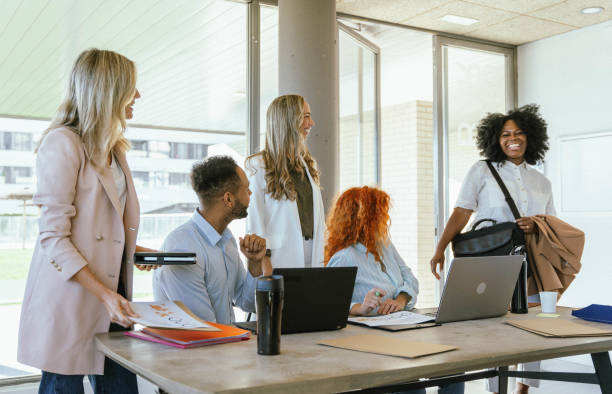 istock Businesswoman smiling while entering the office to work. 1816407894