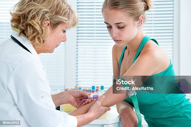 Nurse Taking Blood Sample Stock Photo - Download Image Now - Blood, Analyzing, Teenager