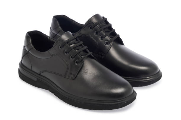 istock Black Leather Shoes On White Background 1816421831