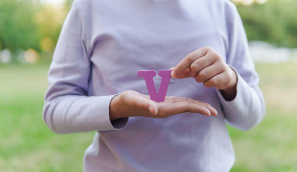 Child Holding Letter \