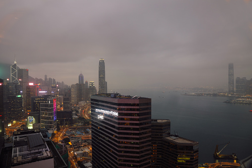 Hong Kong city downtown Victoria harbor skyline city night aerial view