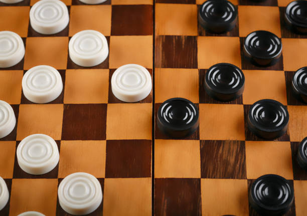 istock checkerboard with checkers. Game concept. Board game. Hobby. checkers on the playing field for a game. 1816448132