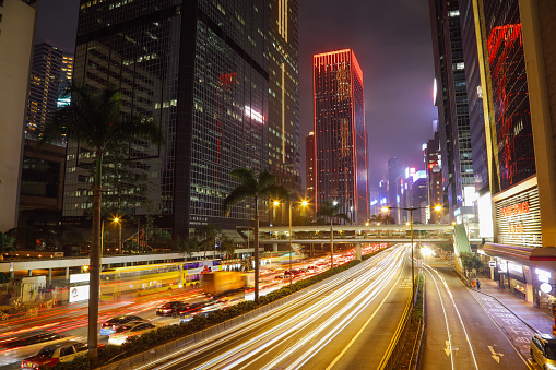 Hong Kong city business downtown traffic speed light night cityscape