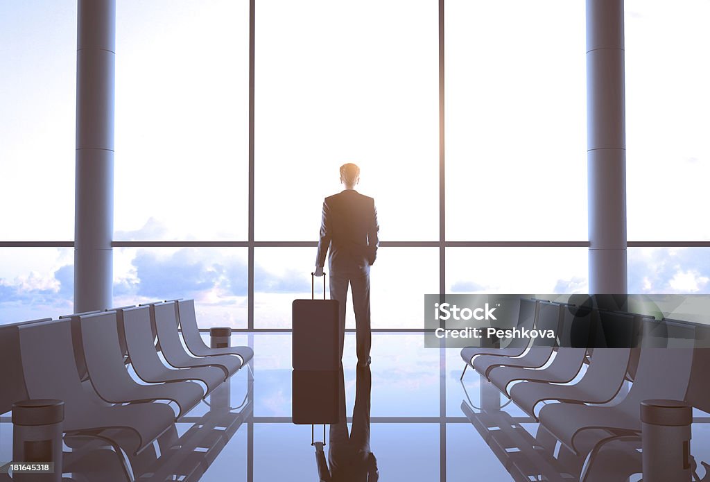 airport interior businessman with luggage in airport Adult Stock Photo