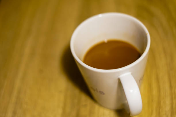 istock coffee in white cup on the wood table 1816458419