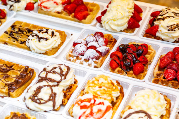 istock Variety of Belgian Waffles with Different Toppings. 1816463355