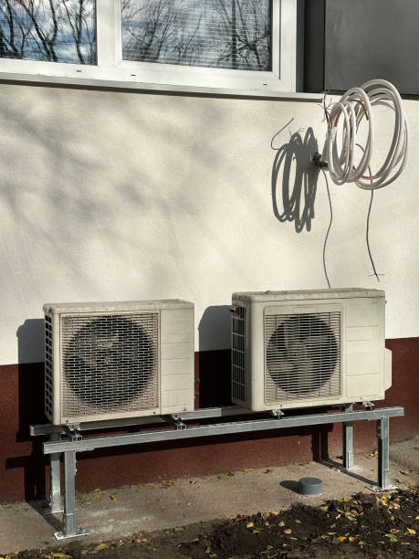 istock Air conditioners next to a wall of a building 1816470105