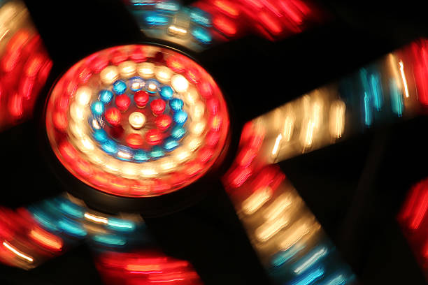 istock Carnival ride- lights from the zipper in motion 181647068
