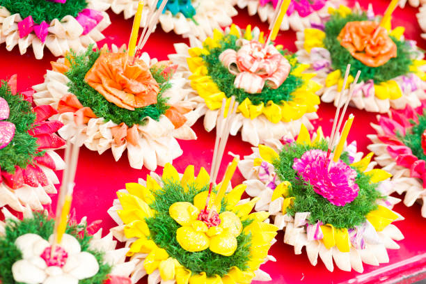 istock Thai Loy Krathong flower bouquets with candle 1816471506