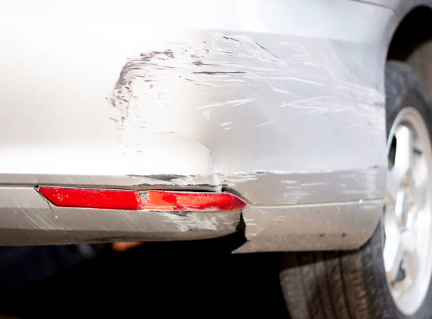 istock Broken and chipped car rear bumper 1816502989