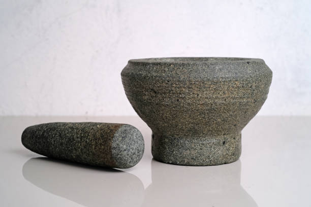 istock Mortar and pestle on a white background with reflection 1816527629