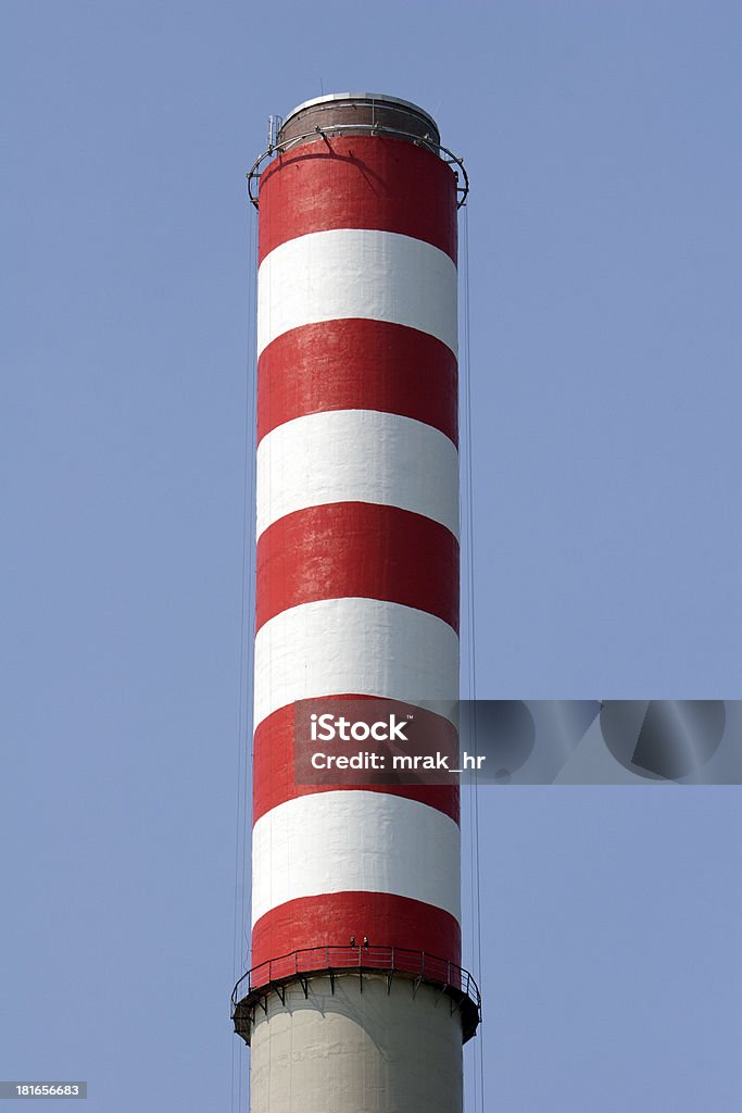 Red and white painted chimney Renewed and fresh painted chimney of power plant Sisak in Croatia Air Pollution Stock Photo