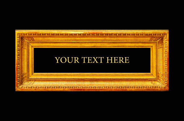 Wide gold picture frame over black background