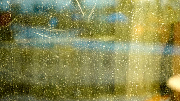 istock A dirty window glass with raindrops 1816592742