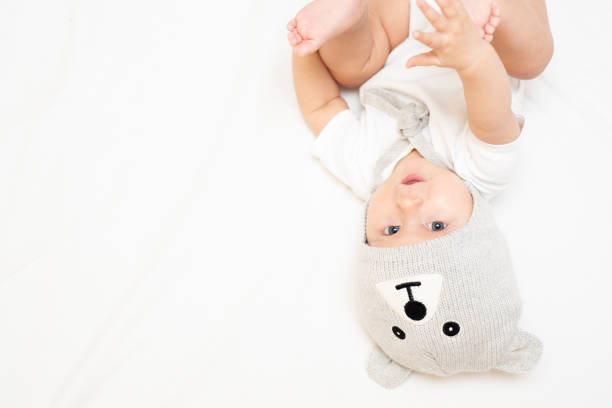 istock Infant baby in grey teddy bear hat 1816619904