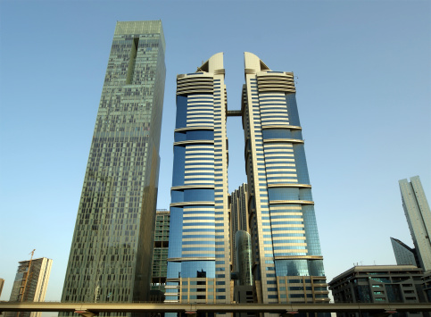 Modern skyscrapers, Sheikh zayed road, Dubai, United Arab Emirates. Dubai is the fastest growing city in the world.
