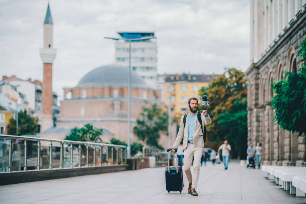 istock Businessman vlogging on business trip 1816629717