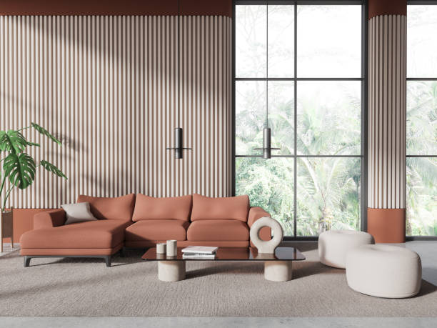 istock Elegant living room interior with sofa and coffee table near panoramic window 1816631837