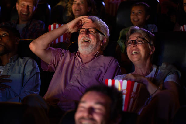 istock Senior couple having a good time while watching a movie 1816634585