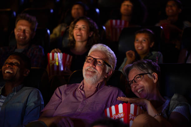 istock Senior couple having a good time while watching a movie 1816634587