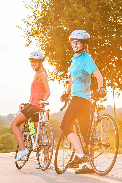 istock Two female athletes together resting 181665116