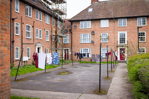 Exterior of blocks of flats, apartment buildings with communal garden in York city centre, UK