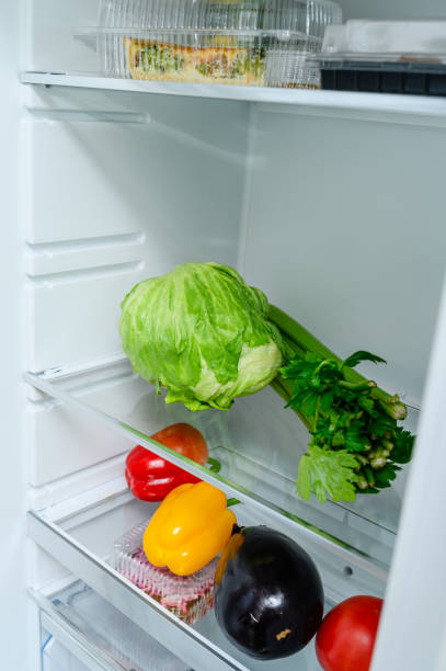 istock Fresh Vegetables lying on the shelf in the fridge 1816683993