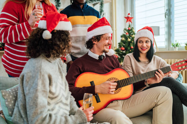 istock Happy friends celebrating Christmas together 1816693585