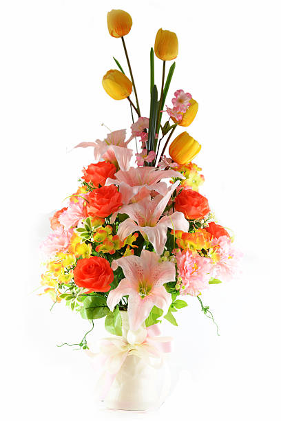 istock Multicolored flowers in a vase, isolated on white background 181669707