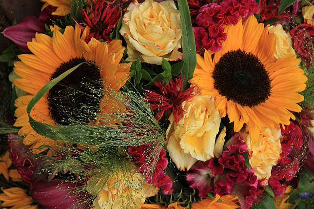 istock Yellow and red flower arrangement 181672108