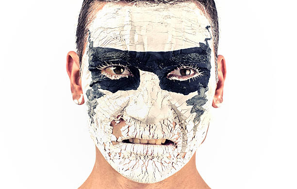 istock Beautiful young man painted on the face,angry 181672286