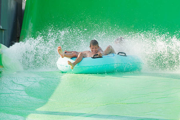 istock boys in aquapark 181673790