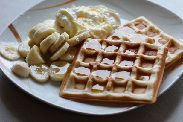 istock Waffle, banana and maple syrup 1816743710