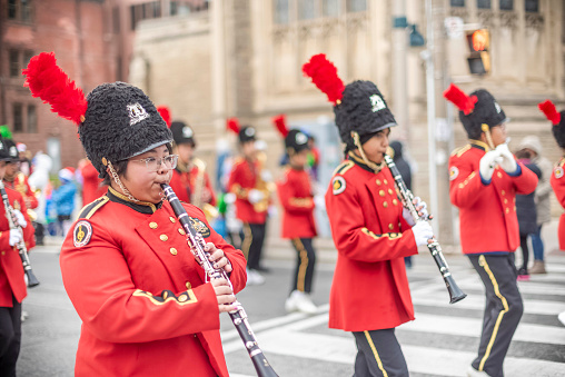 Toronto Ontario, Canada- November 26th, 2023: An Asian marching band playing Christmas music during Toronto’s annual Santa Claus Parade.