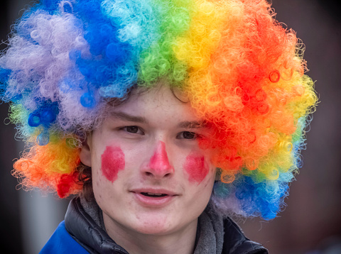 Toronto Ontario, Canada- November 26th, 2023: A man dressed as a clown during Toronto’s annual Santa Claus Parade.