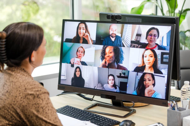 istock Unrecognizable woman attends virtual meeting with co-workers 1816744467
