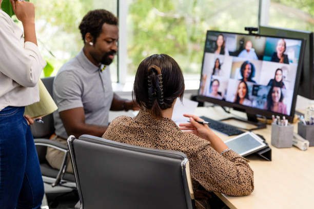 istock Three businesspeople video conference co-workers to brainstorm solution 1816744490