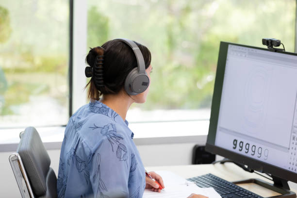 istock Unrecognizable female college student works on class project 1816744492
