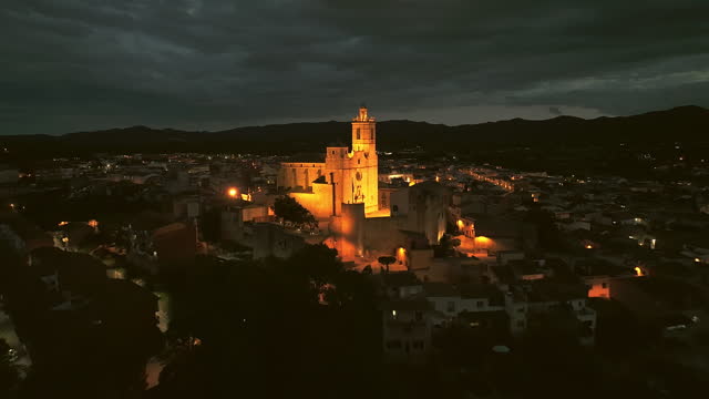 Aerial video of Llagostera church at night