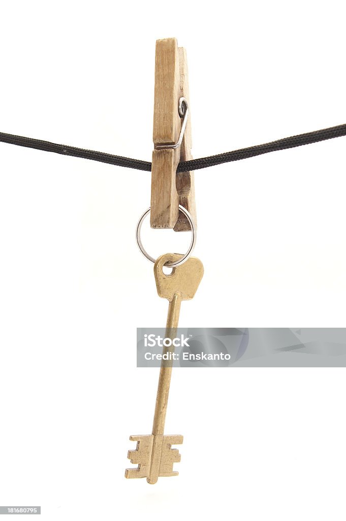 Chave, mola de roupa e corda em um fundo branco - Royalty-free Antigo Foto de stock