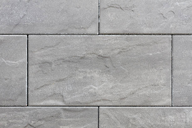 istock Stone plates in grey on a sideway with seams 181682996