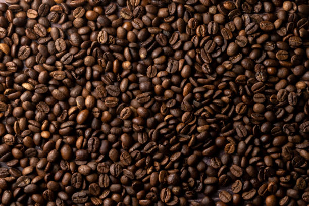 istock Roasted coffee beans background. Healthy beverage ingredients 1816831832