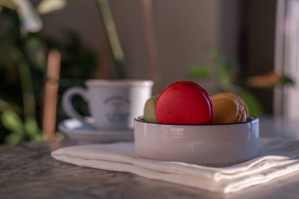istock Colorful macarons on a white plate with filter coffee 1816833007