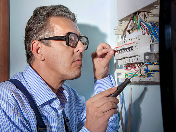 electrician at work electrician works with wires cable tester stock pictures, royalty-free photos & images