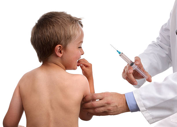 istock Child and vaccination syringe 181685945