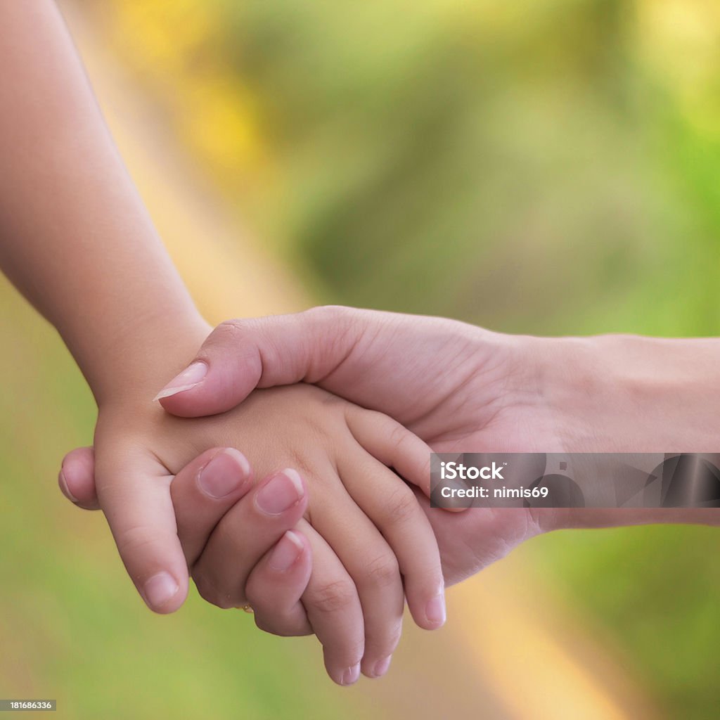Sisters holding hands Assistance Stock Photo