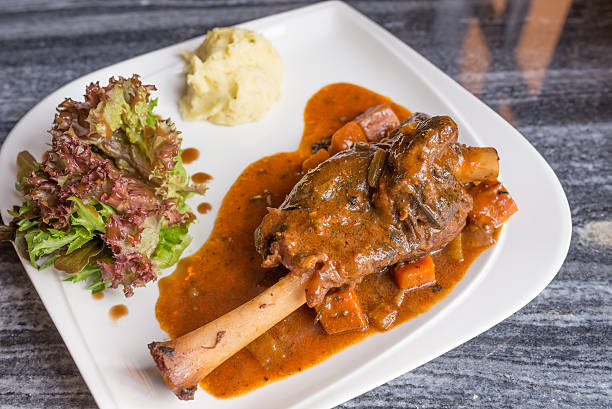 istock Grilled German pig leg with black pepper sauce 181686429
